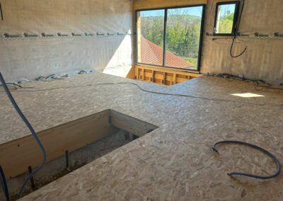Surélévation en ossature bois avec vide sur séjour à Gleizé (69) – Un projet sur mesure signé Buffin Charpente